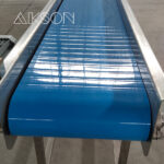 Briefly describe the features of easy-to-clean conveyor belts and weight sorters